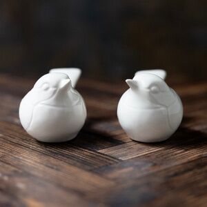 Pair of white ceramic birds figurines made in Japan vintage 4 inches long